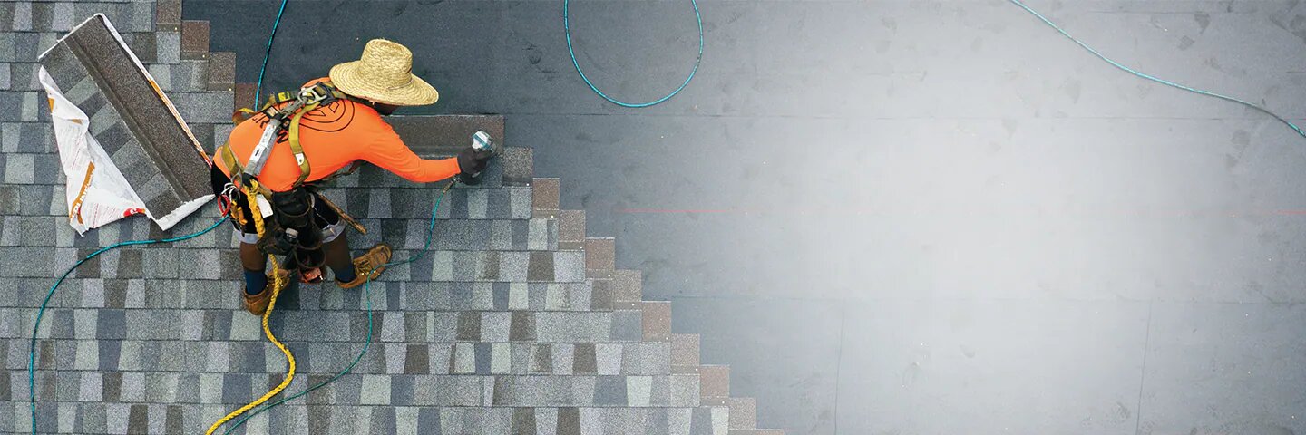 Construction worker on site near framing